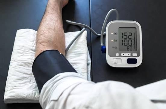 Doctor reviewing remote patient monitoring vitals data